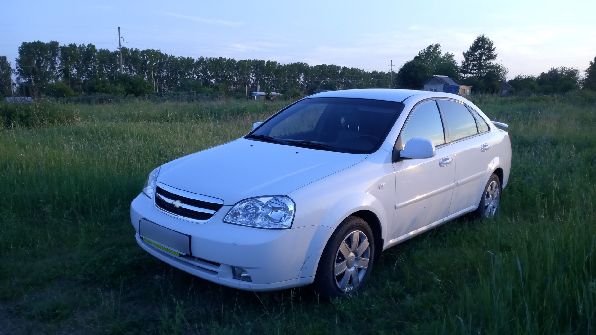 Chevrolet Lacetti Sedan 1.6 бензиновый 2011 | Белый седан на DRIVE2