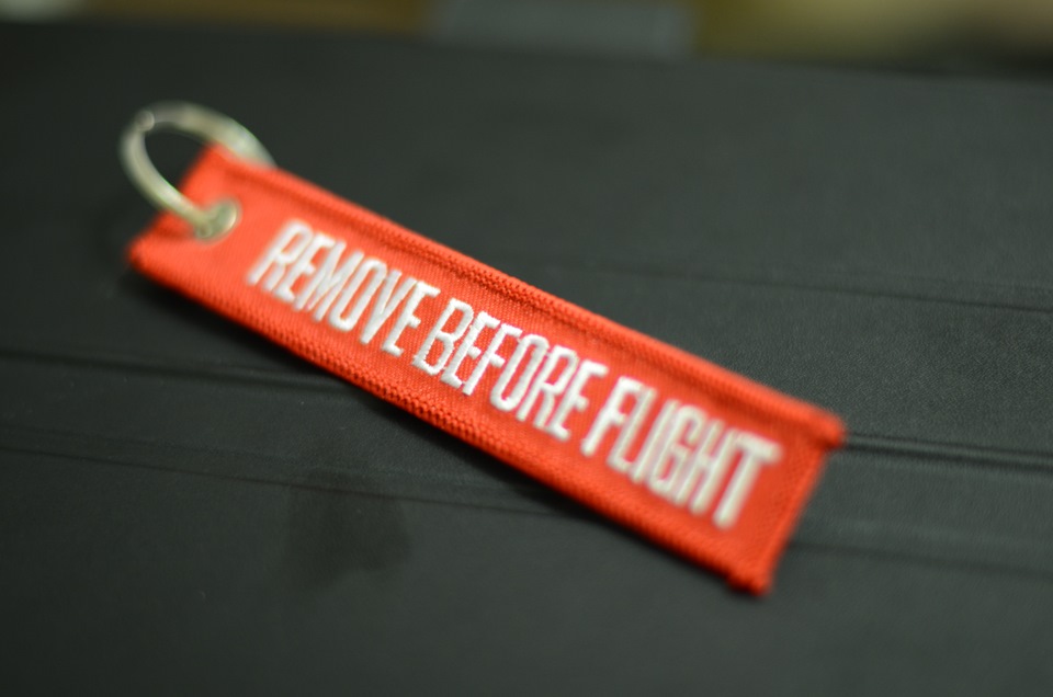 Remove before Flight 737. Remove before Flight. Kiss before Flight.