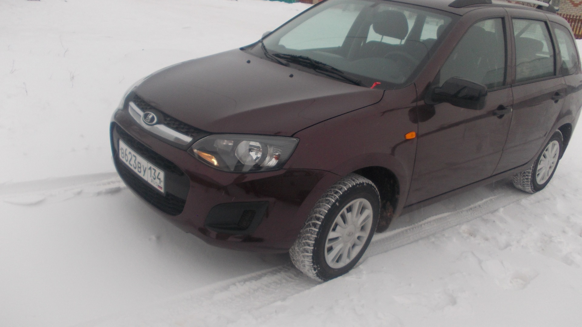 Lada Калина 2 универсал 1.6 бензиновый 2014 | темно-вишневая на DRIVE2