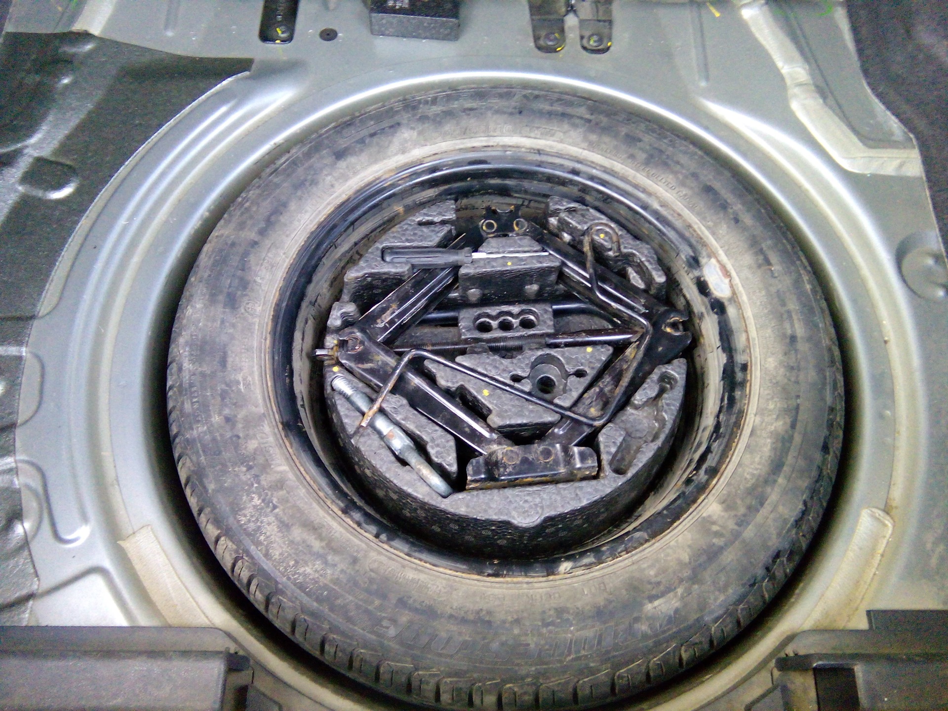 Запасное колесо энгельс полиграфическая. Запаска Opel Astra h GTC.