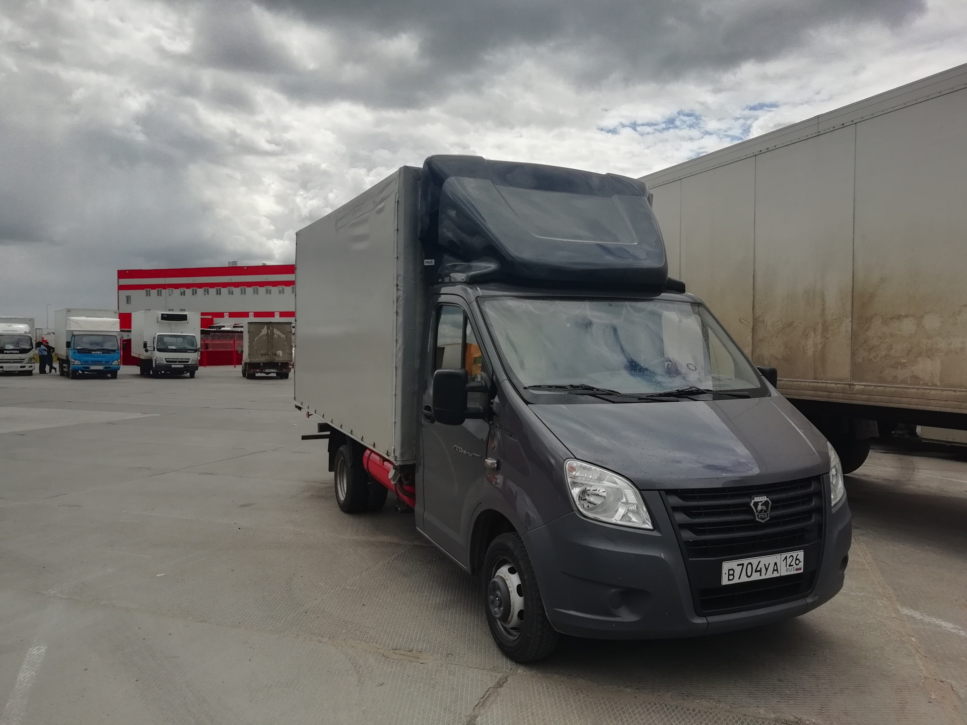 Next сер. Газель Некст серая. ГАЗ a21r32 европлатформа. Газель Некст 6м евротент белая. Газель Некст шторм грей.