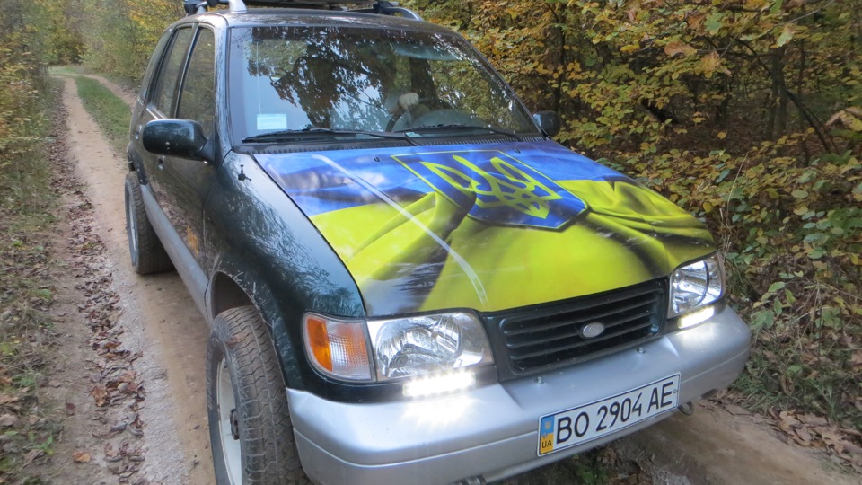 KIA Sportage дракончик