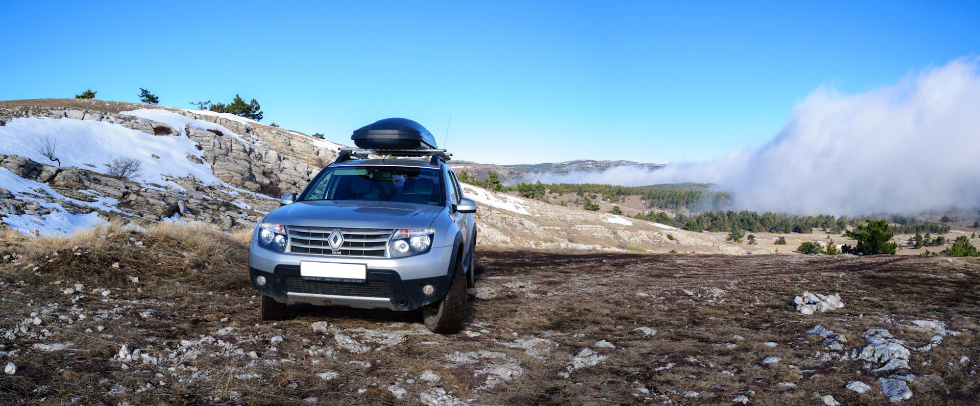 Рено дастер в крыму. Рено Дастер реклама. Renault Duster на фоне гор.