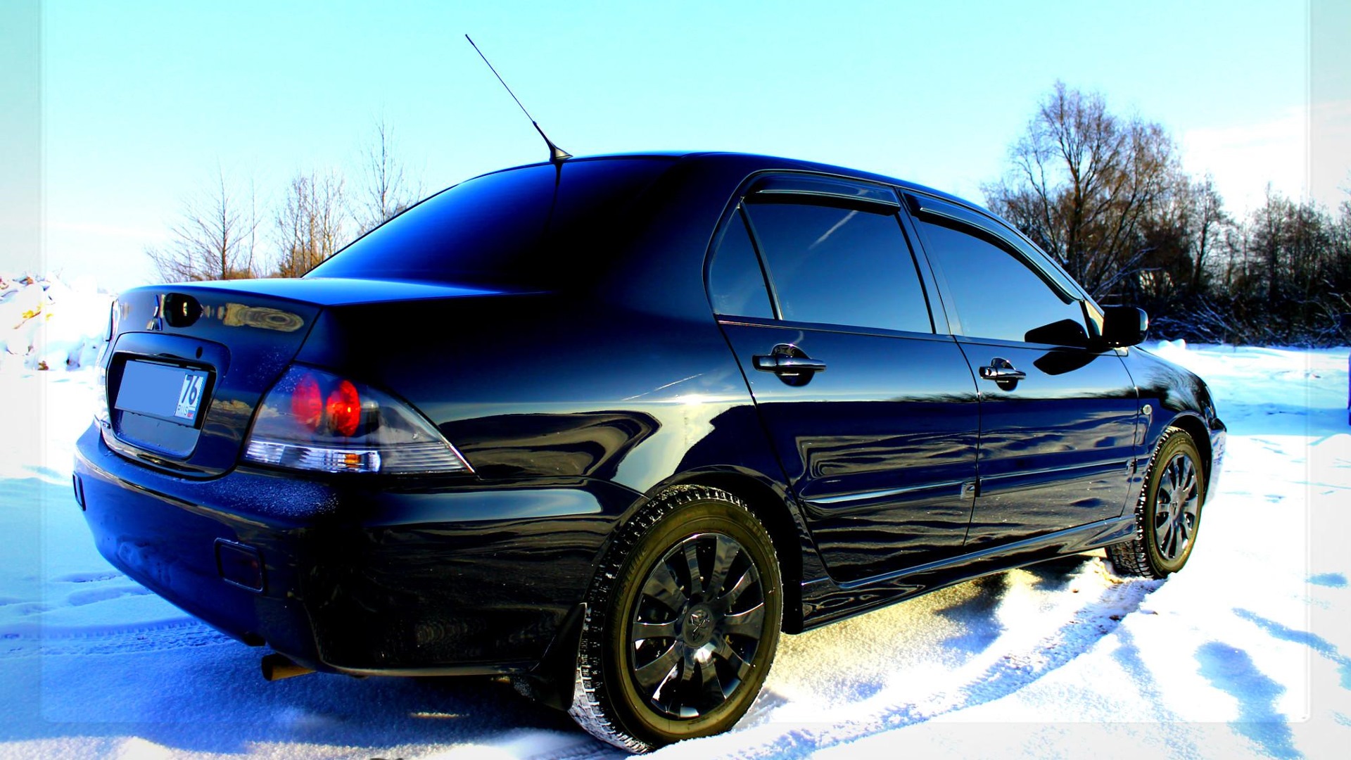 Фото mitsubishi lancer 2006 год черный цвет