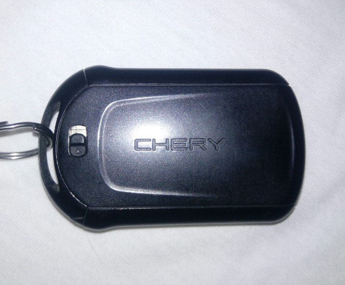 Брелок chery. Штатная сигналка чери бонус а13. Tiggo 4 SMARTKEY. Брелок сигнализации от чери Кимо. Чери амулет штатная сигнализация.