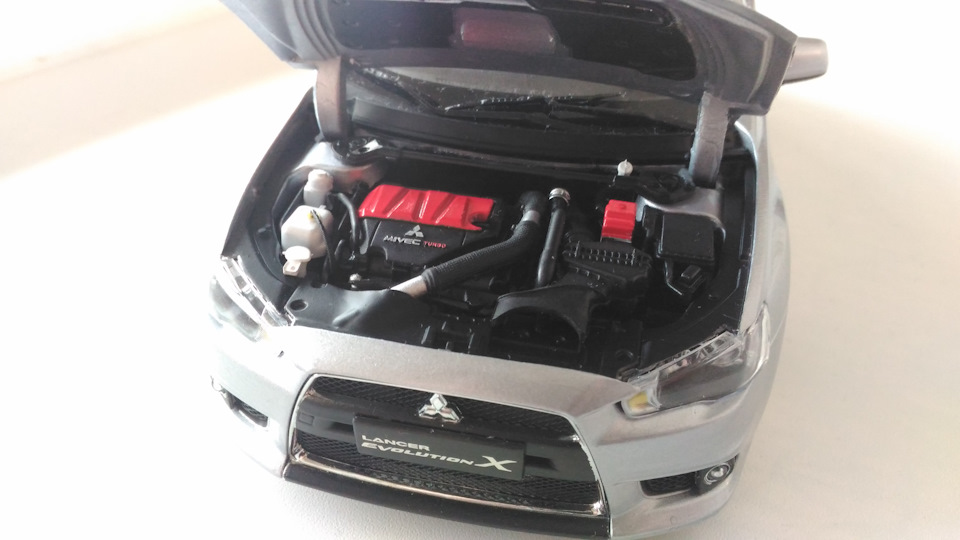 Модель Lancer Evolution X 1:18 — Mitsubishi Lancer X, 1,6 л, 2012