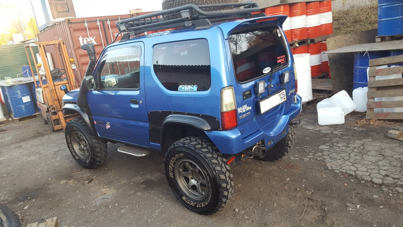Suzuki jimny на низкопрофиле. Зимние шины сузуки джимни. Suzuki jimny на низкопрофиле. Оригинальные диски сузуки джимни. 235/85 r16 jimny.