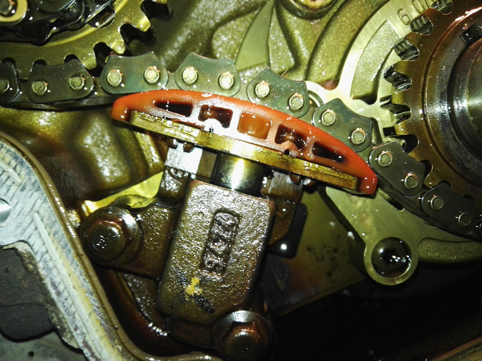 это натяжитель средней/основной цепи — Chevrolet Captiva (1G)