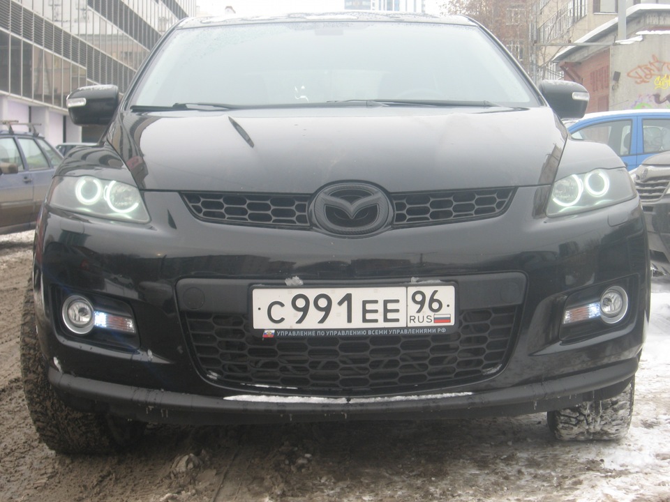 Mazda cx 7 фары. Mazda CX 7 ангельские глазки. Фары Мазда сх7 2008. Фары на мазду cx7. Обвес Мазда СХ 7.