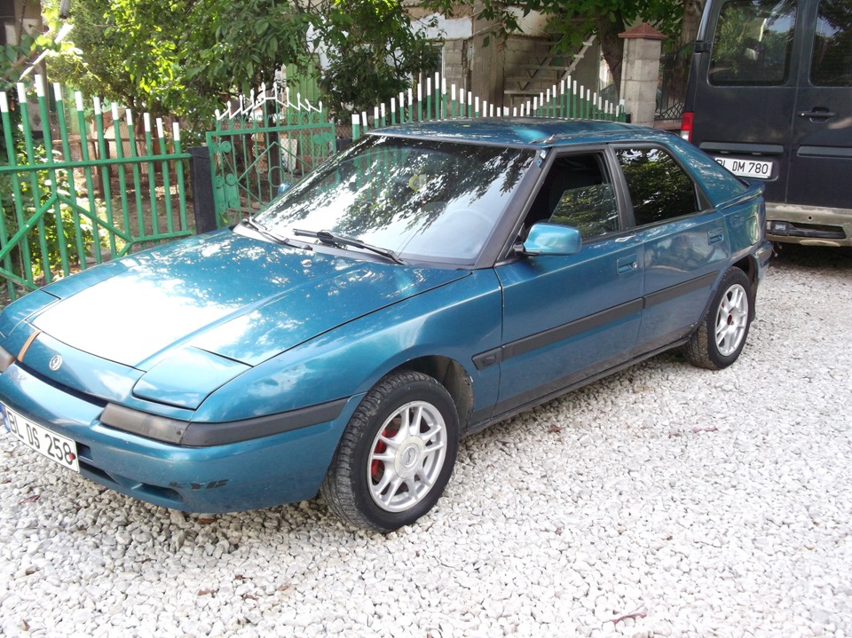 Mazda 323 1993 хэтчбек. Mazda 323 1993. Мазда 323 1993. Мазда 323 1993. Мазда 323 iv bg.