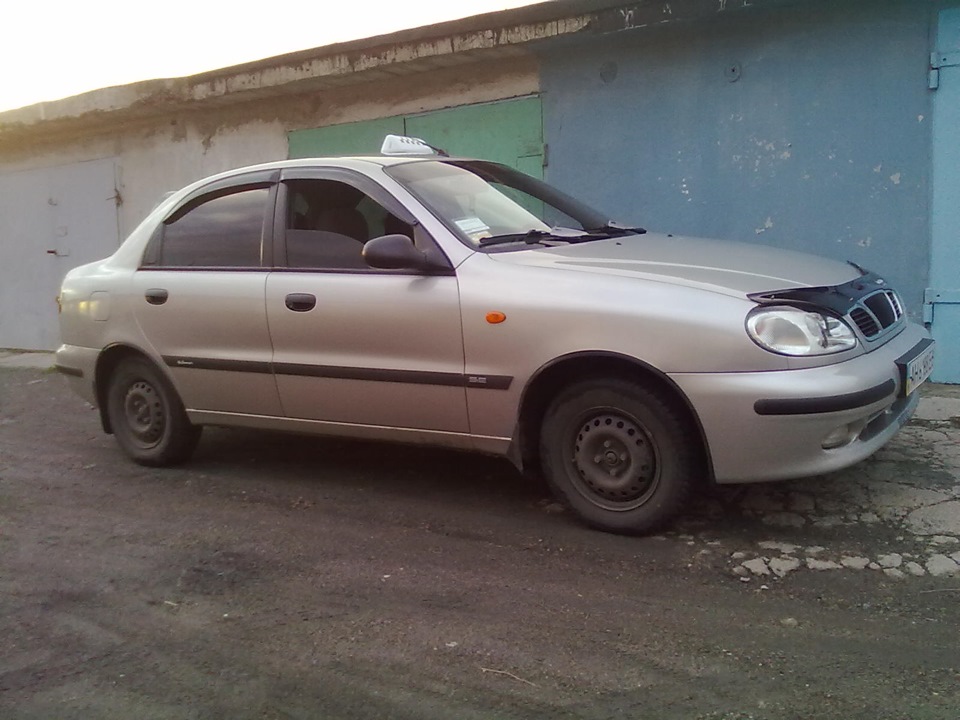 Daewoo lanos такси белый