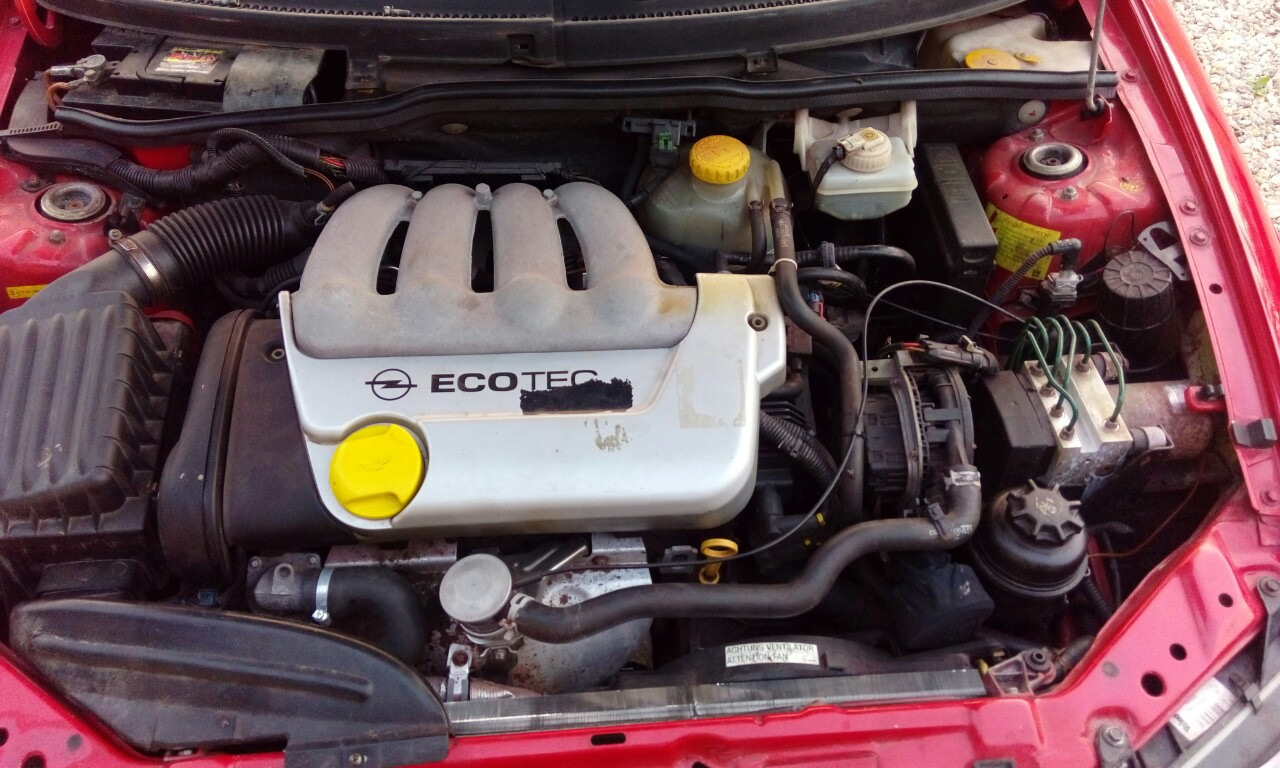 Опель вектра б 1.6 бензин. Opel Corsa b под капотом. Opel Corsa b x14xe. Подкапотка Опель Вектра с 1.6. Опель тигра 1995 под капотом.