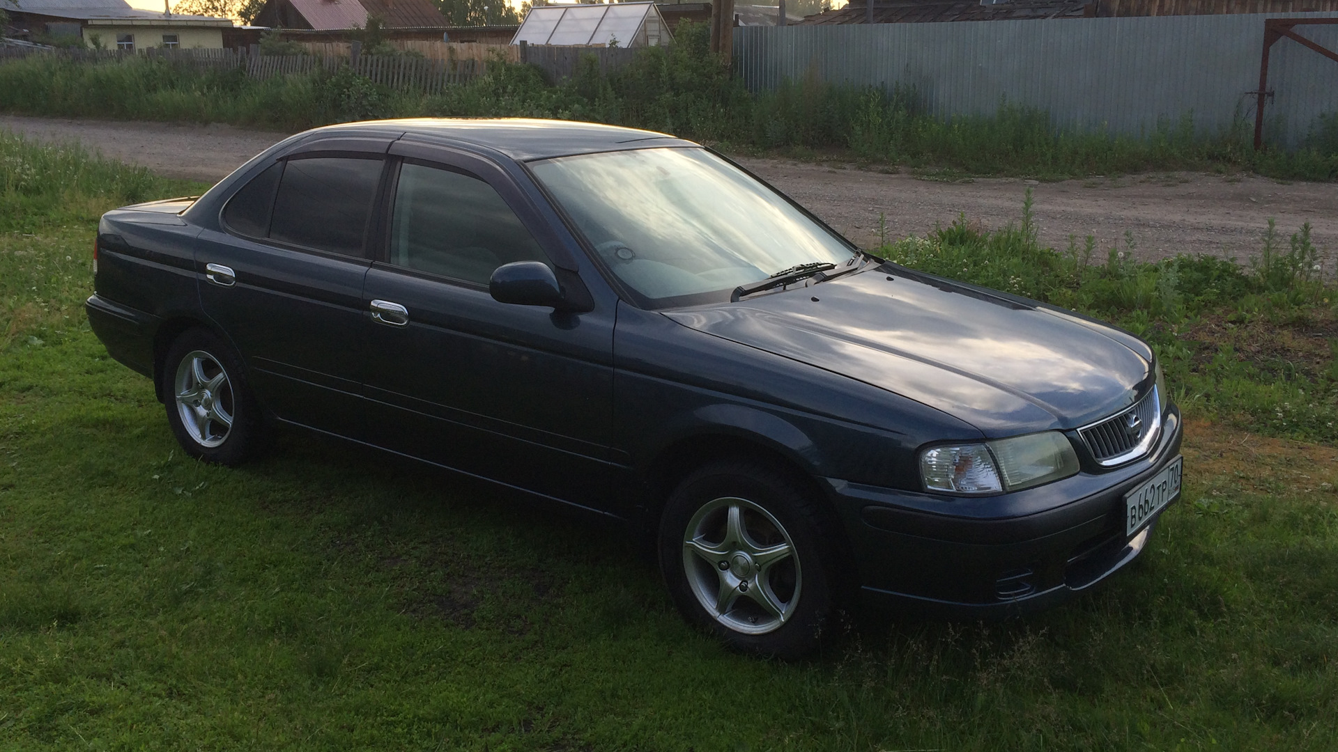 Ниссан санни фото. Nissan Sunny b15 super Saloon. Ниссан Санни черный 2002.