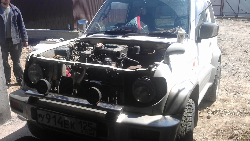 Mitsubishi pajero junior двигатель 4а31. Двигатель митсубиси паджеро джуниор. Где номер двигателя мицубиси паджеро джуниор. Mitsubishi pajero junior 1. Двигатель мицубиси паджеро джуниор.