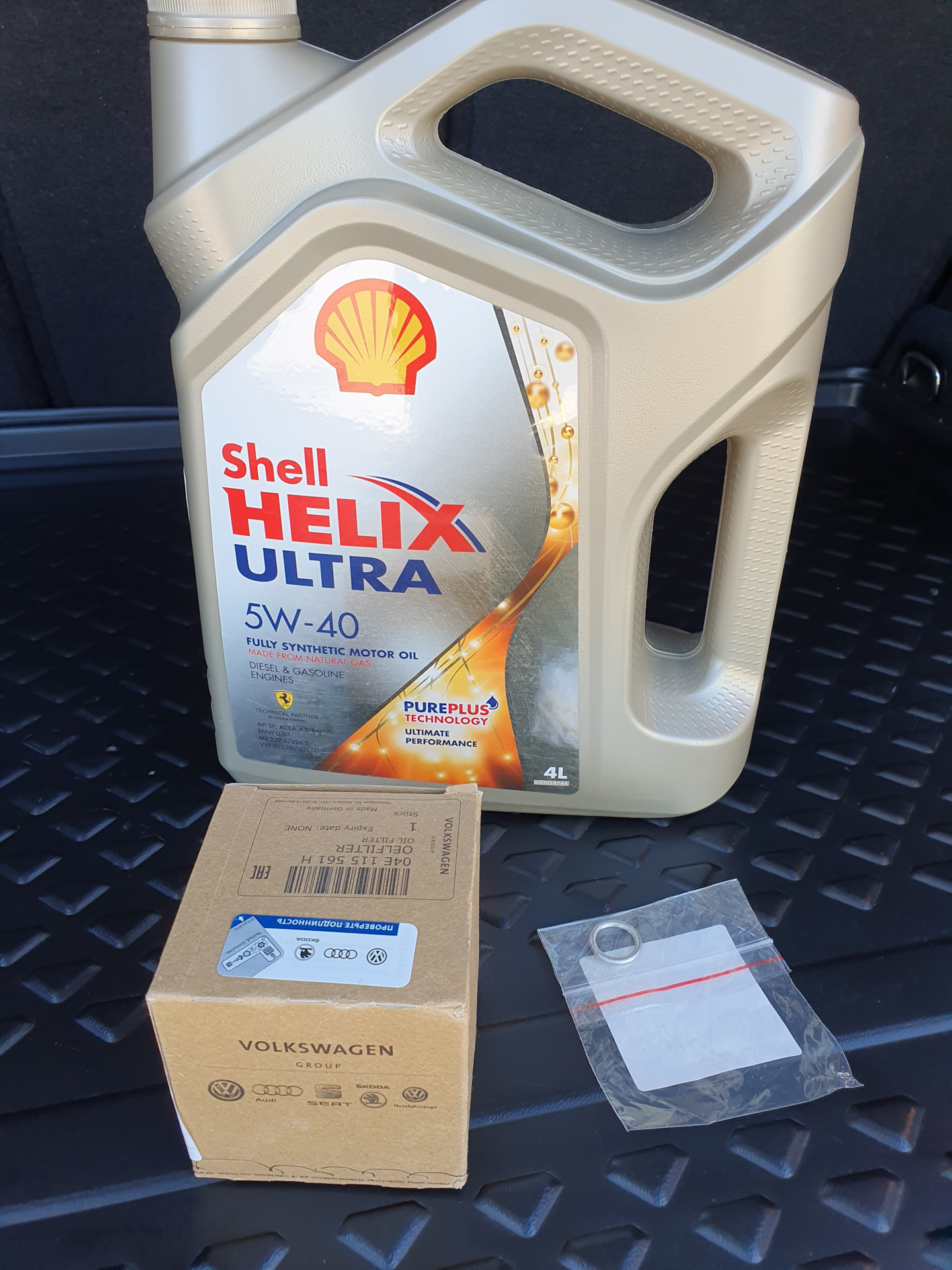 Залить shell. Shell Helix Ultra API SP. Масло Шелл для Фольксваген Тигуан дизельный. Моторное масло для Фольксваген Тигуан 1.4 150 л.с турбо бензин.