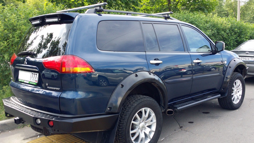 Митсубиси паджеро спорт 3 дизель 2.4. Pajero Sport 2 MT. Мицубиси Паджеро спорт 2 с велобагажником.