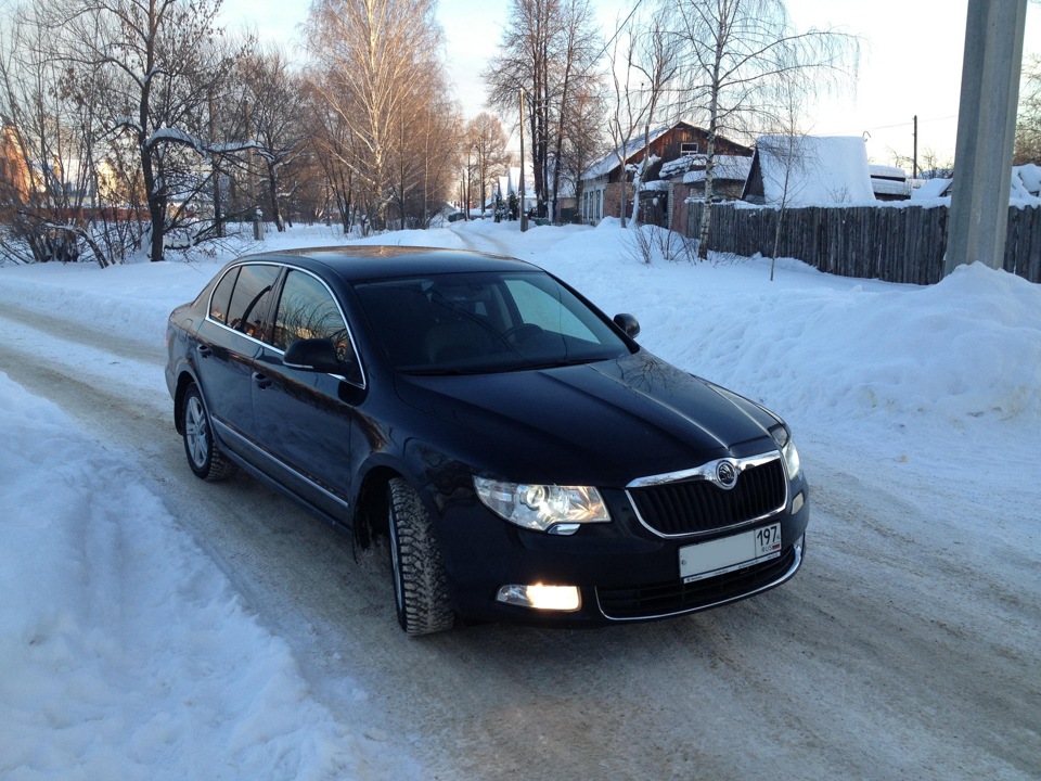 Skoda Superb Winter Forest