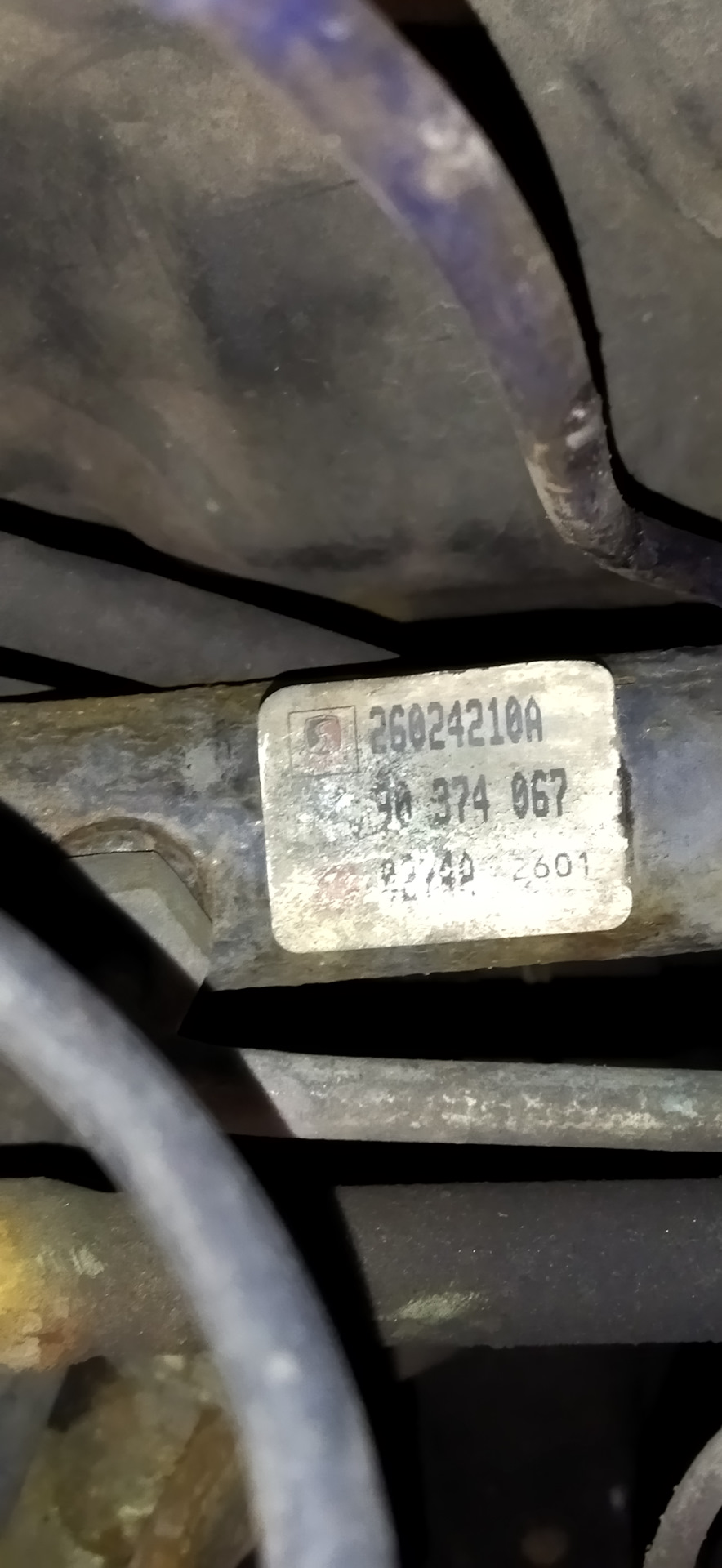 Стояла такая рейка. Насколько помню на астру ставили 3 вида реек. — Opel Astra F. Запчасти на фото: 26024210A