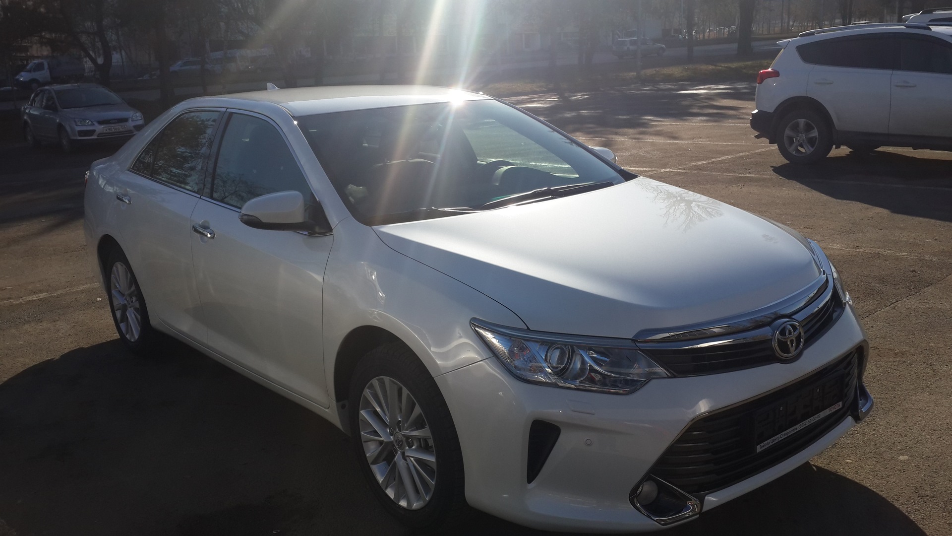 Toyota Camry 55 белый перламутр