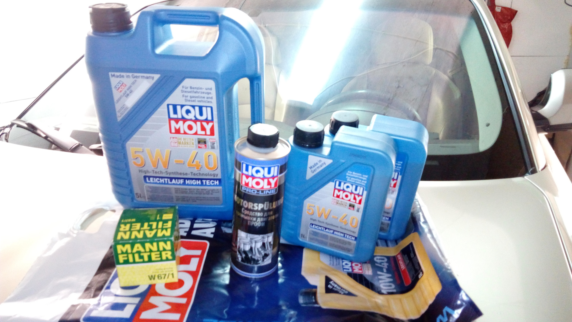 мойка двигателя автомобиля. средство для чистки двигателя от масла. какое масло отмоет двигатель. средство для чистки масла с двигателя. химия для отмывки двигателя.