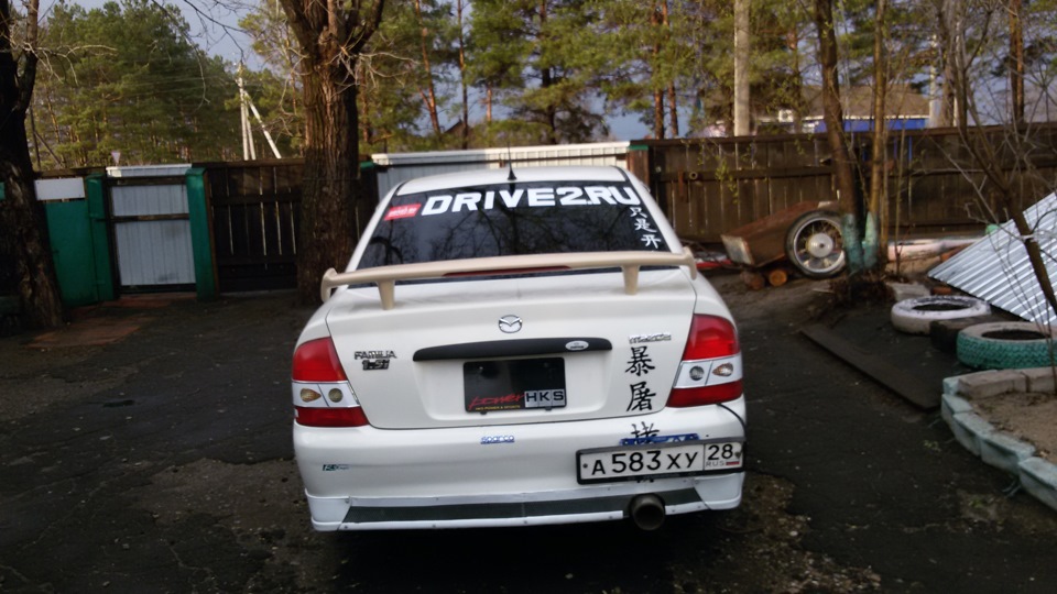 наклейка драйв — Mazda Familia (BJ), 1,6 л, 2000 года | аксессуары | DRIVE2