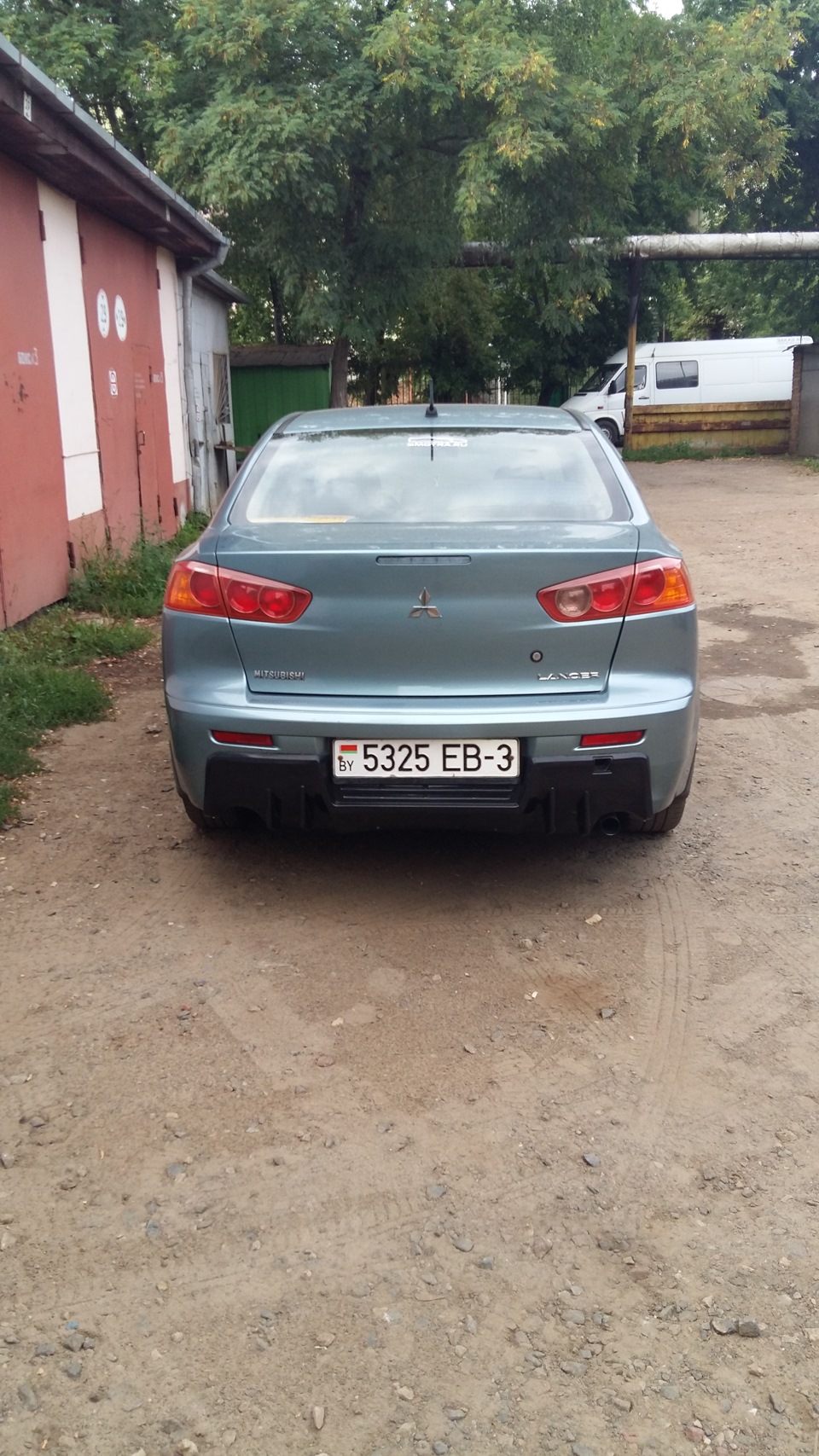 Диффузор на задний бампер под раздвоенный выхлоп) — Mitsubishi Lancer X ...