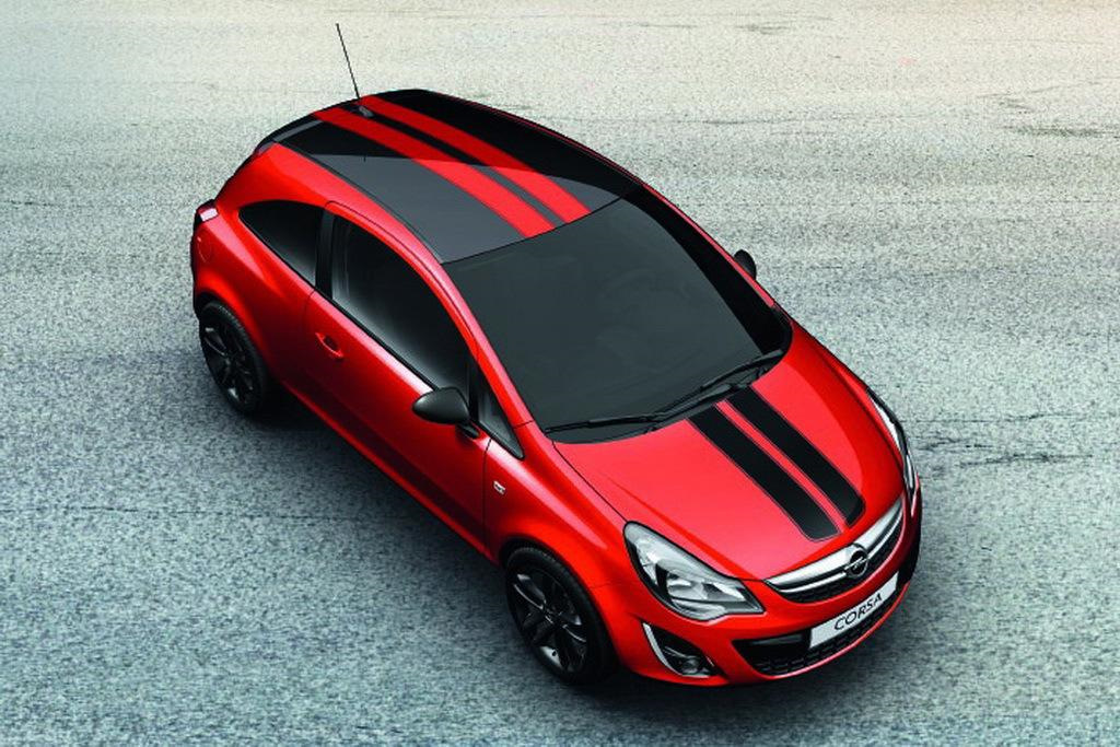 Машина с черной полосой. Opel Corsa GTC. Opel Corsa 2010 крыша. Opel Corsa 2022. Опель Корса красная.
