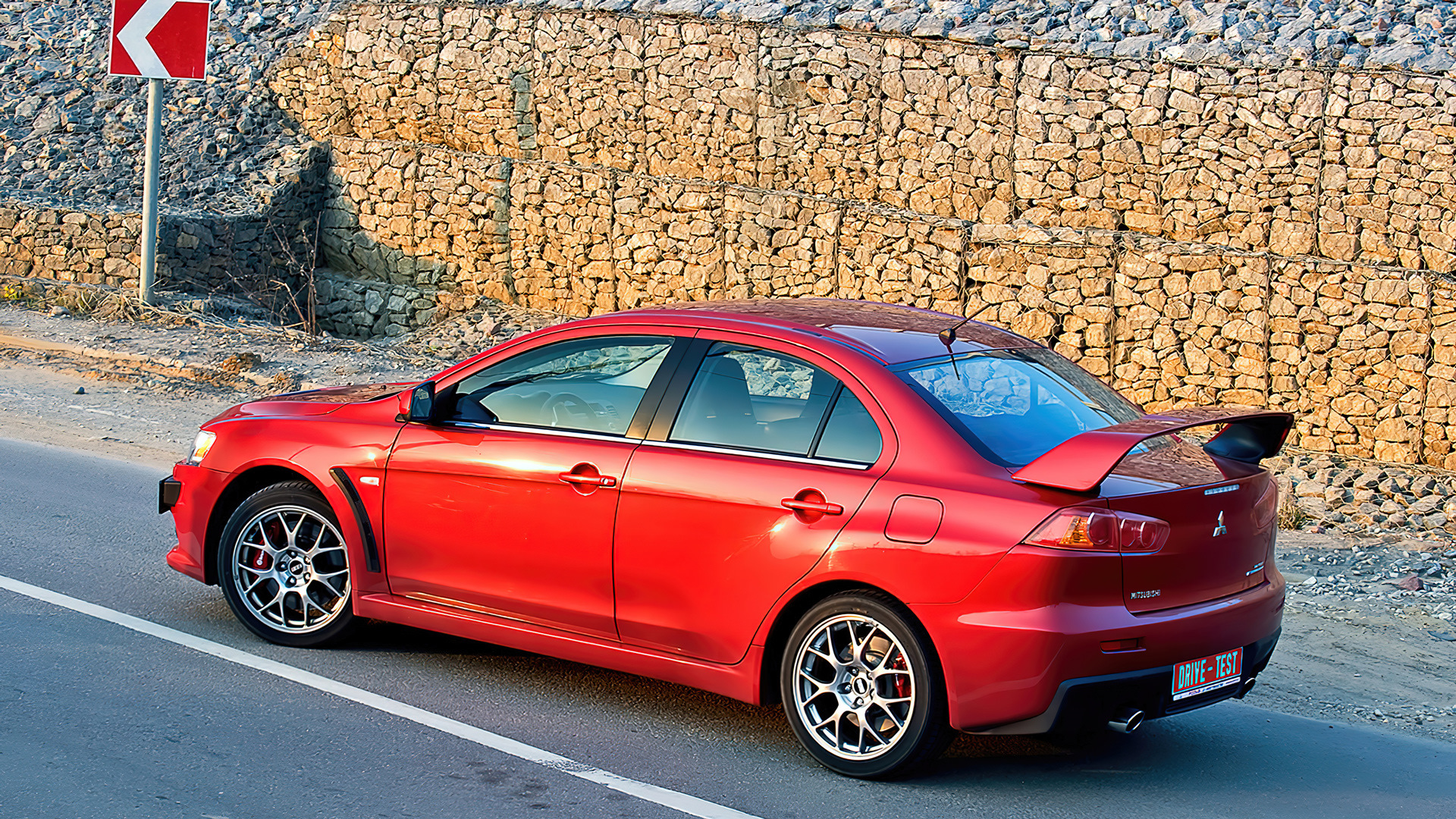 Mitsubishi lancer 12. Mitsubishi Lancer Evolution x 2012. Мицубиси седан. Разгон Митсубиси Лансер Эволюшн.