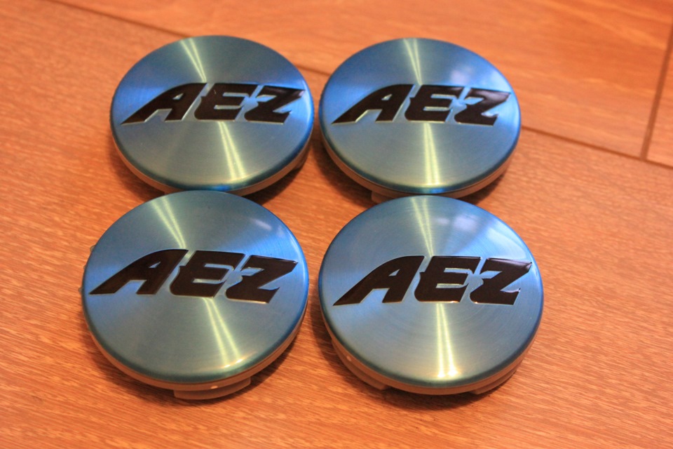 Купить логотип на диски. Колпачок ступицы диска AEZ. Колпачки для литых дисков r19 q5 2018 артикул. Колпачок ступицы AEZ. Заглушки на литые диски AEZ r17.