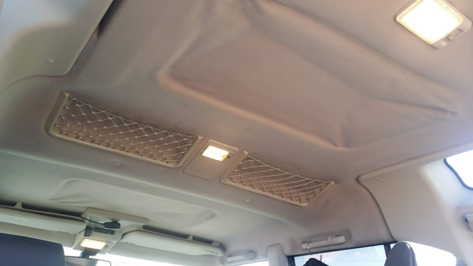 Как снять потолок land rover discovery