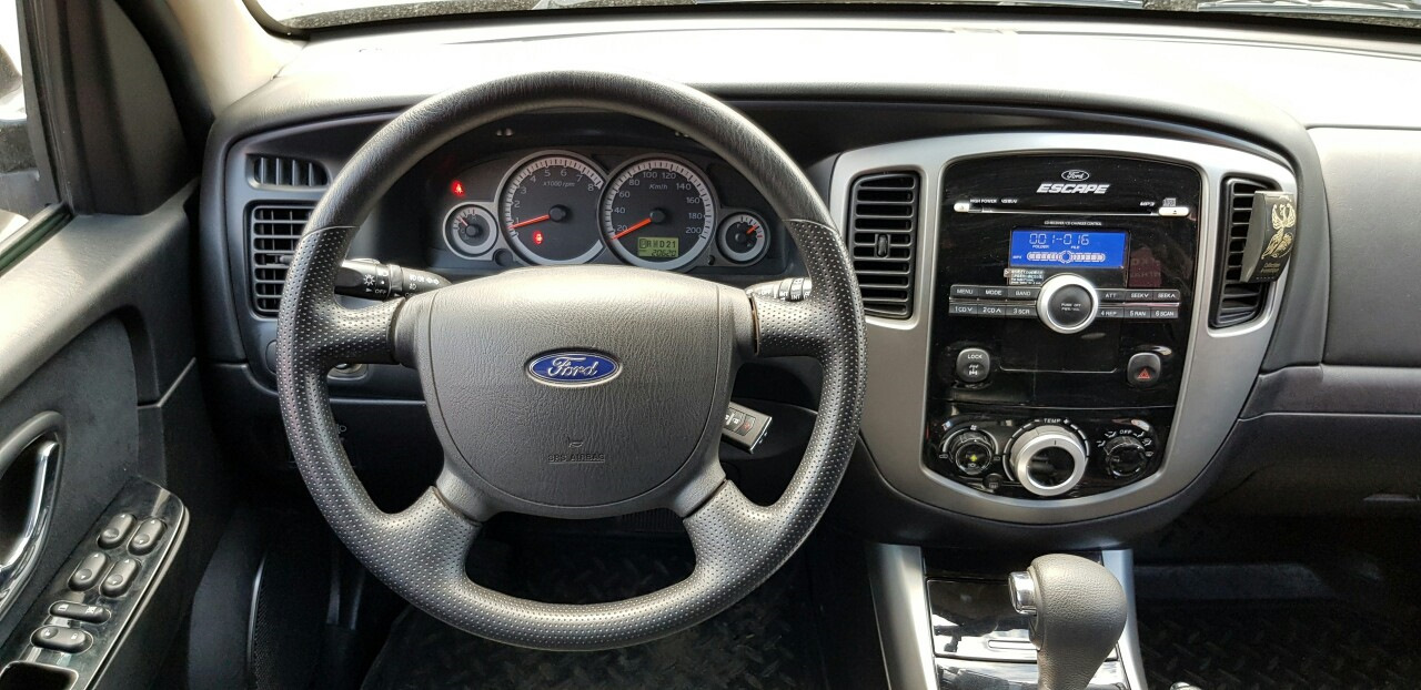 Escape управление. Ford Escape r3 2008. Ford Escape 2008 2.3. Ford Escape 2008 магнитола. Магнитола Форд Эскейп 2008.