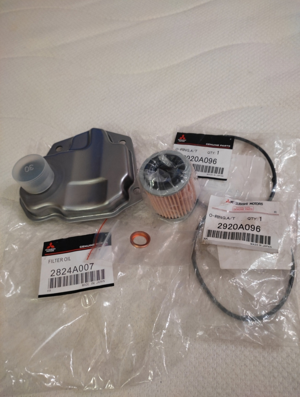 Фото в бортжурнале Mitsubishi Outlander (3G). Запчасти на фото: 2824A007, ORING, 2920A096