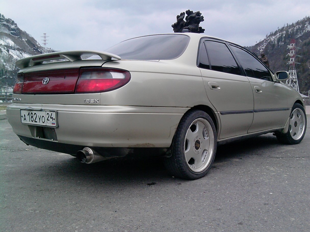 Тойота улыбка. Тойота Карина 1993 обвес. Toyota Carina 1993 тюнинг. Тойота Карина 4a1349394. Тойота Карина 1993 тюнинг.