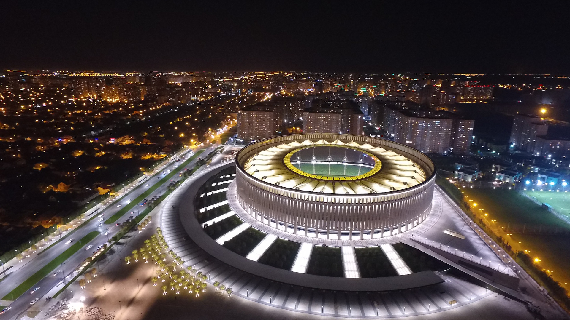 Стадион ночью. Олимпийский стадион 2023. Стадион Краснодар с высоты птичьего полета ночью. Стадион Краснодар с высоты птичьего. Ночной стадион Краснодар.
