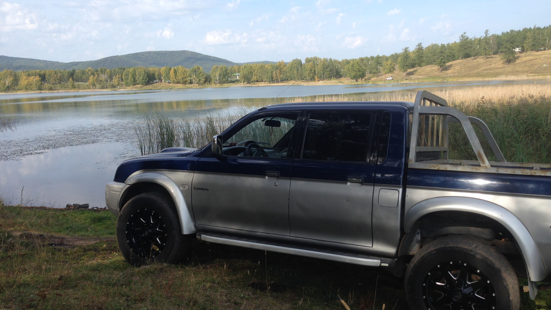 Л200 олд. Mitsubishi l200 2002 года. Арки на Mitsubishi l200 2005. Мицубиси л200 2.5 дизель 2002. Арки на Митсубиси л200 Олд.