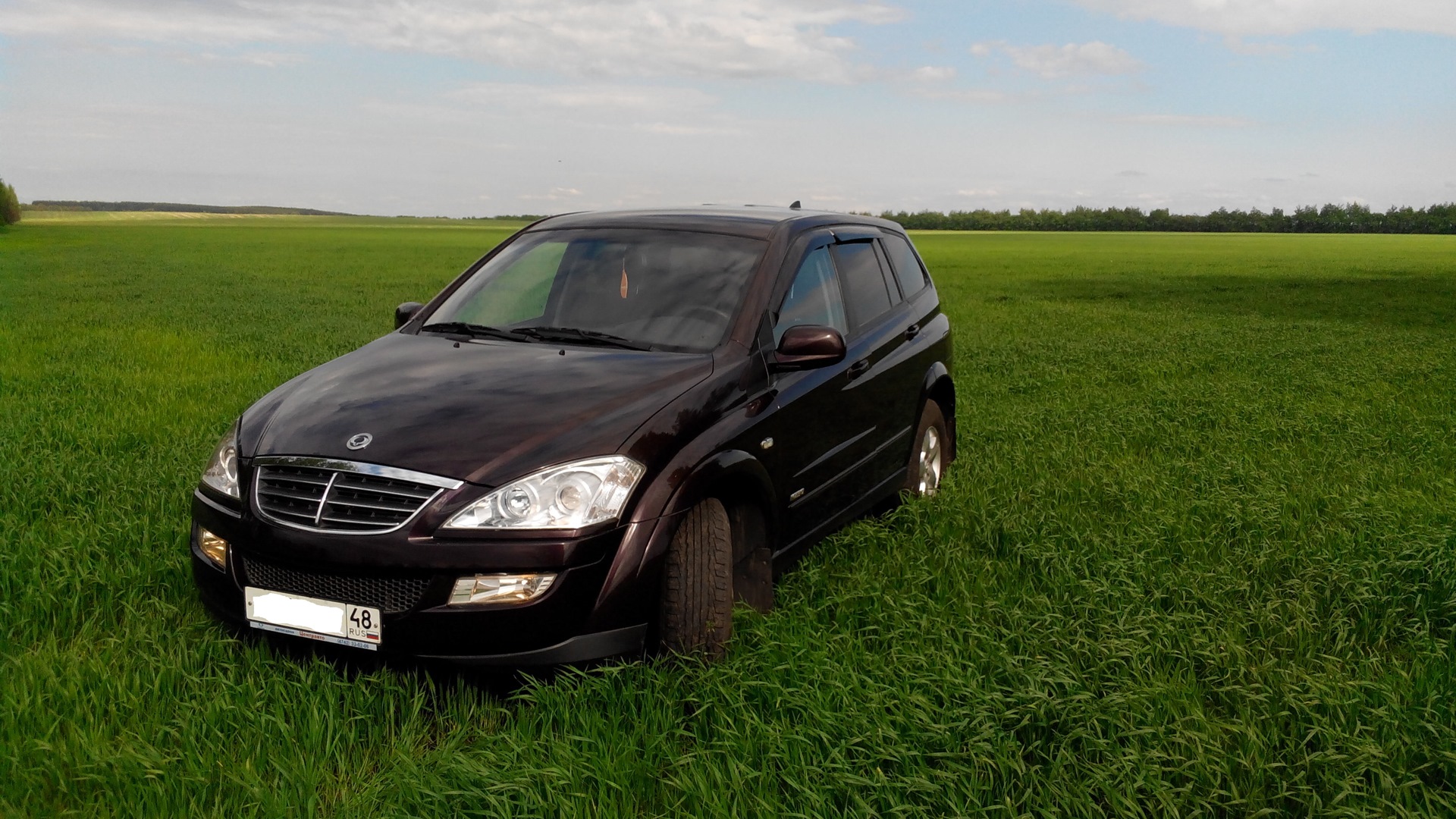 Сан енг Торрес. SSANGYONG Kyron с прицепом.