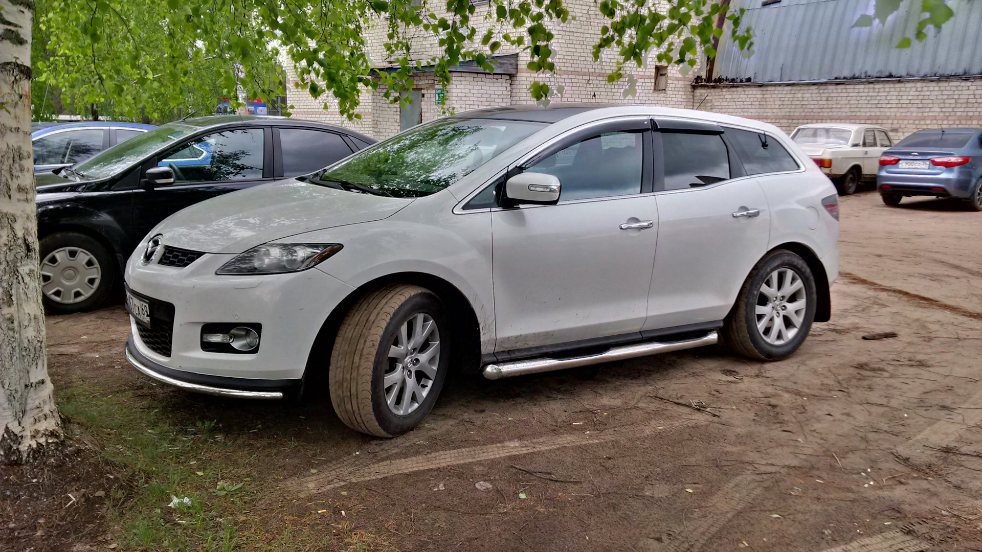 7 порогов. Мазда cx7 2008 белая. Mazda CX 7 пороги. Защита порогов Мазда сх7. Стайлинг Мазда сх7.