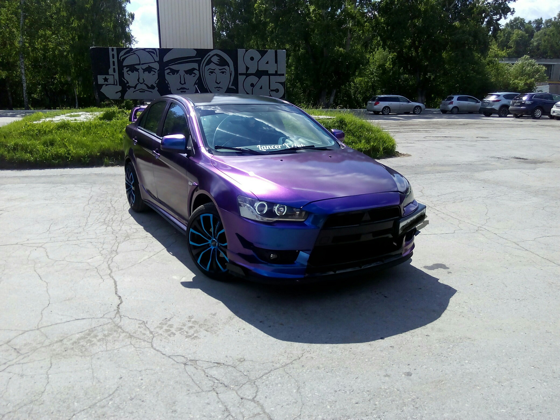 Цвета лансера. Mitsubishi Lancer 10 хамелеон. Митсубиси Лансер 10 хамелеон. Митсубиси Лансер 10 фиолетовый хамелеон. Лансер 10 в пленке хамелеон.