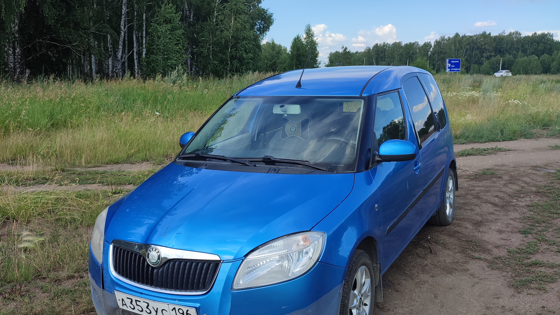 Skoda Roomster 1 2