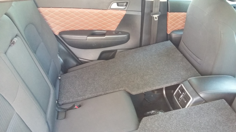 Как раскладываются задние сиденья в киа спортейдж