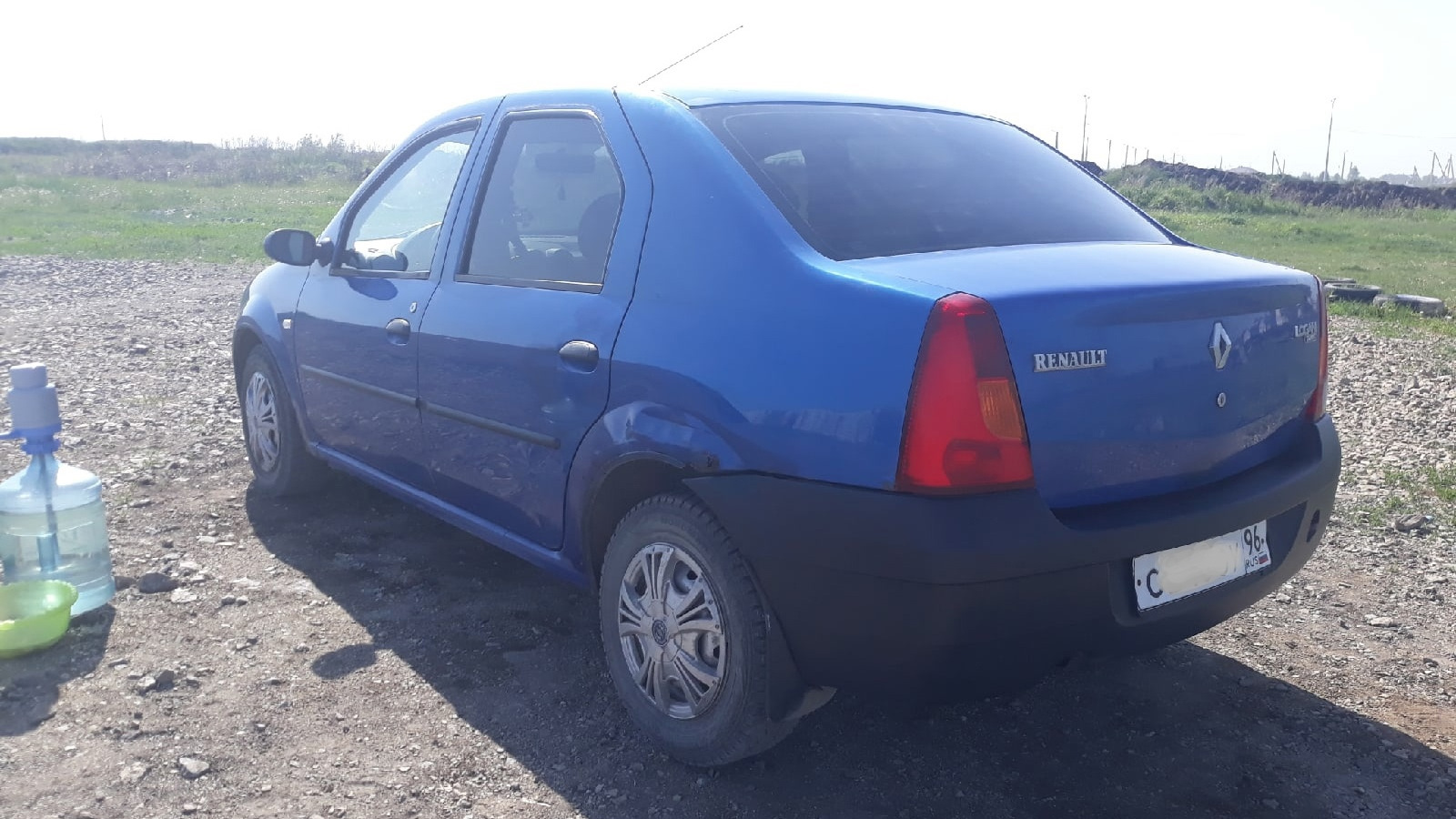 Рено логан с номерами. Рено Логан 2005 года. Renault Logan 2005 синий. Рено Логан синий 2005 год. Рено Логан номер 390.