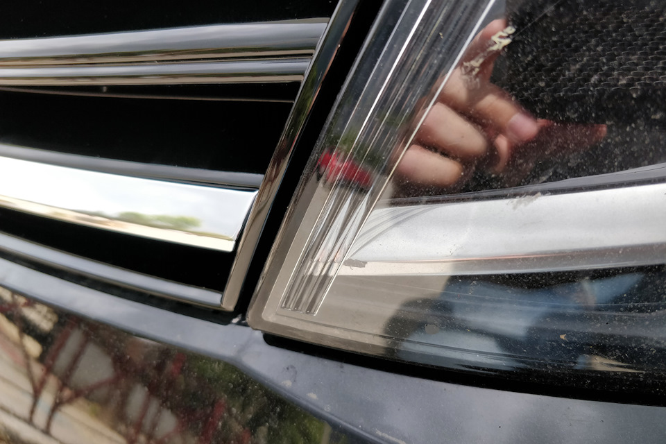 Shiny chrome on the grille, matte chrome inside the headlight…and a dead black bug — Volkswagen Golf Mk7