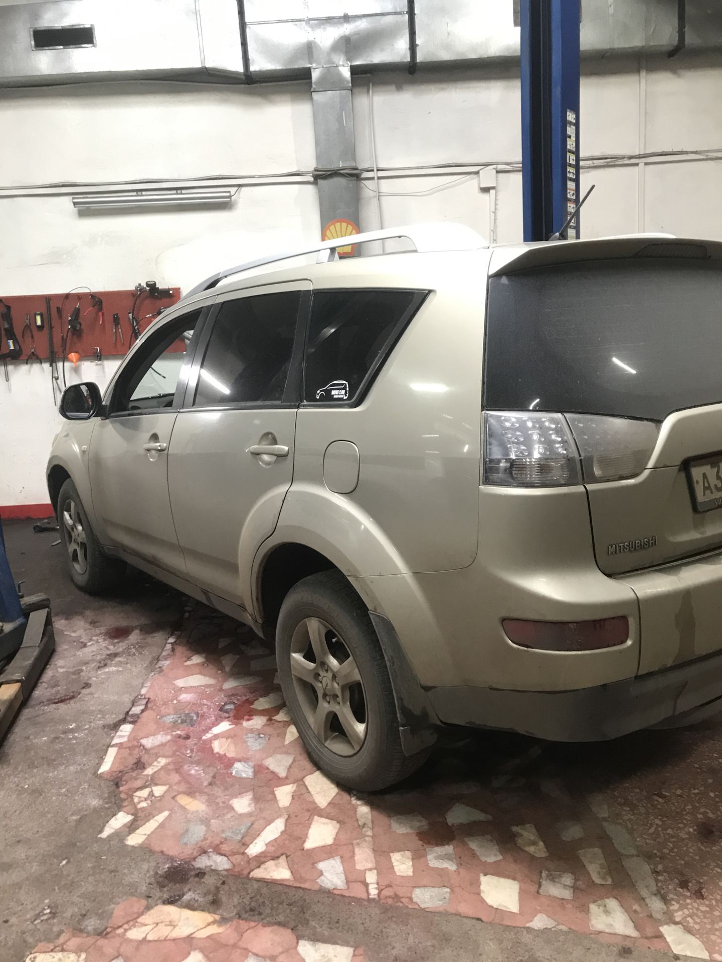 headlamp leveling service required mitsubishi outlander xl