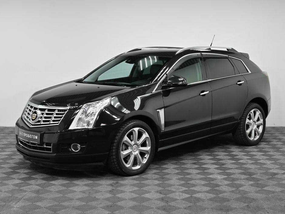 Cadillac SRX — Land Rover Range Rover Evoque (1G)
