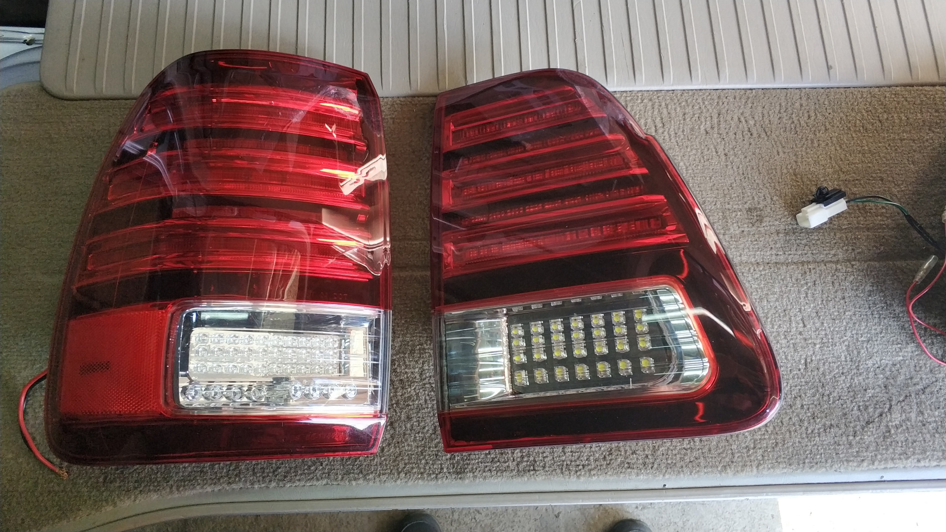 Toyota land cruiser 100 правый руль. Toyota land cruzer 100 черный elfird. Toyota land cruiser 100 2002. Land cruiser 100 обвес 200. спойлер lexus lx470.