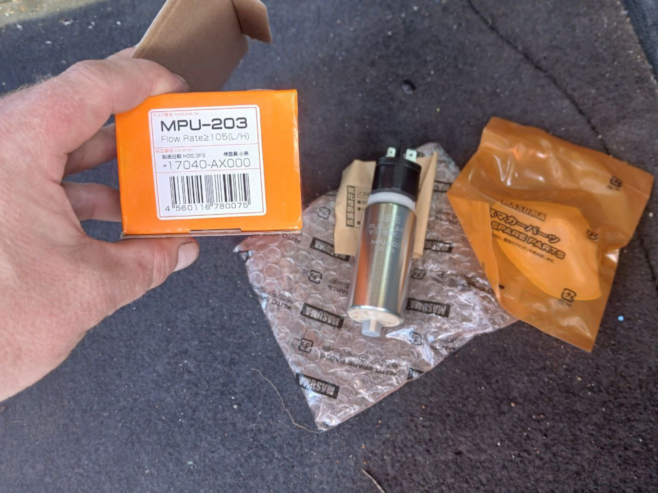 . — Nissan Tiida (1G). Запчасти на фото: MPU203