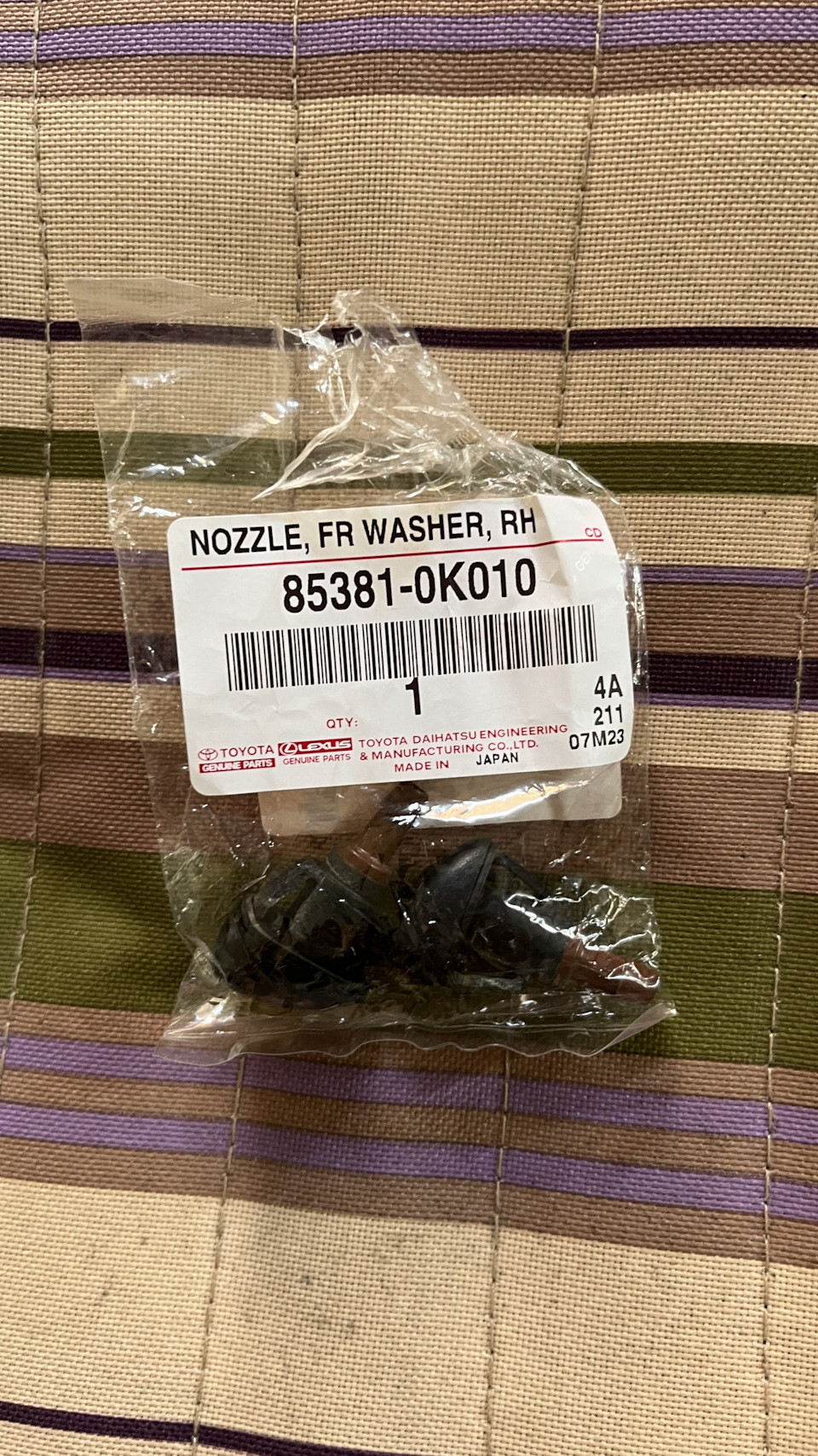 На фото старые в пакете из под новой. — Mitsubishi Lancer X. Запчасти на фото: 853810K010