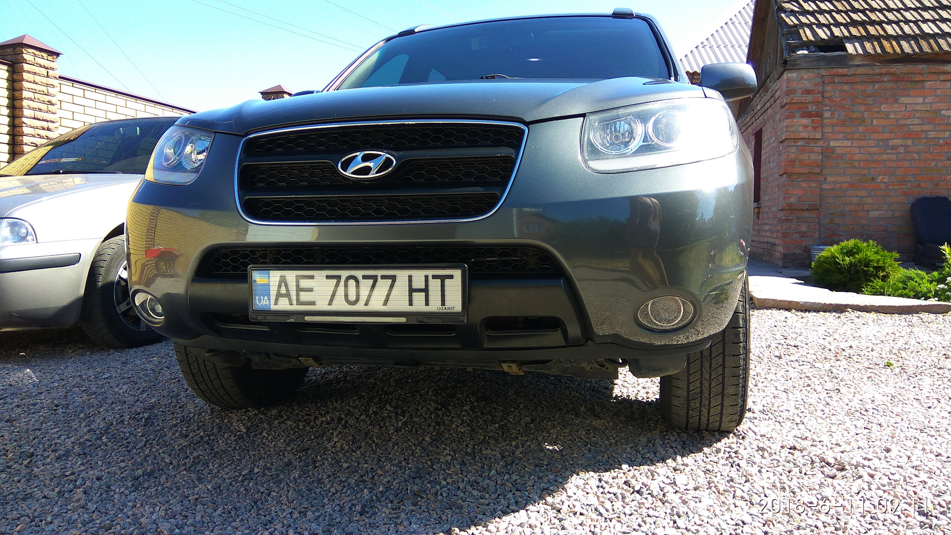 Противотуманные фары hyundai santa fe. ПТФ Санта Фе 2. Линза на Hyundai Santa Fe 2007.