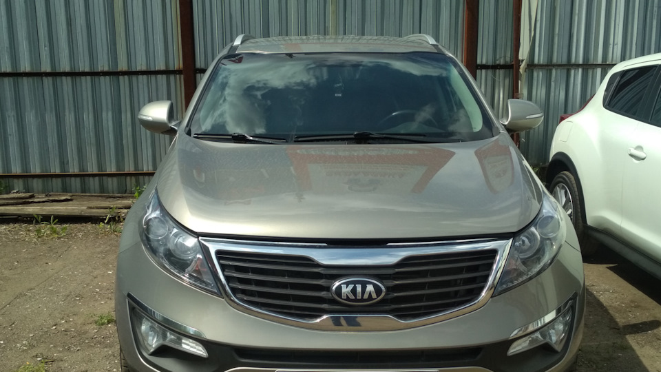 Замена роликов, ремня навесного оборудования — KIA Sportage (3G), 2 л ...