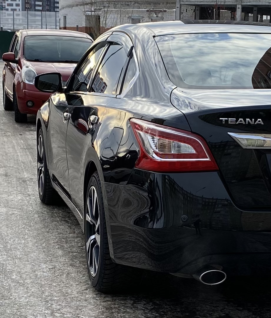 nissan altima blacked out tail lights